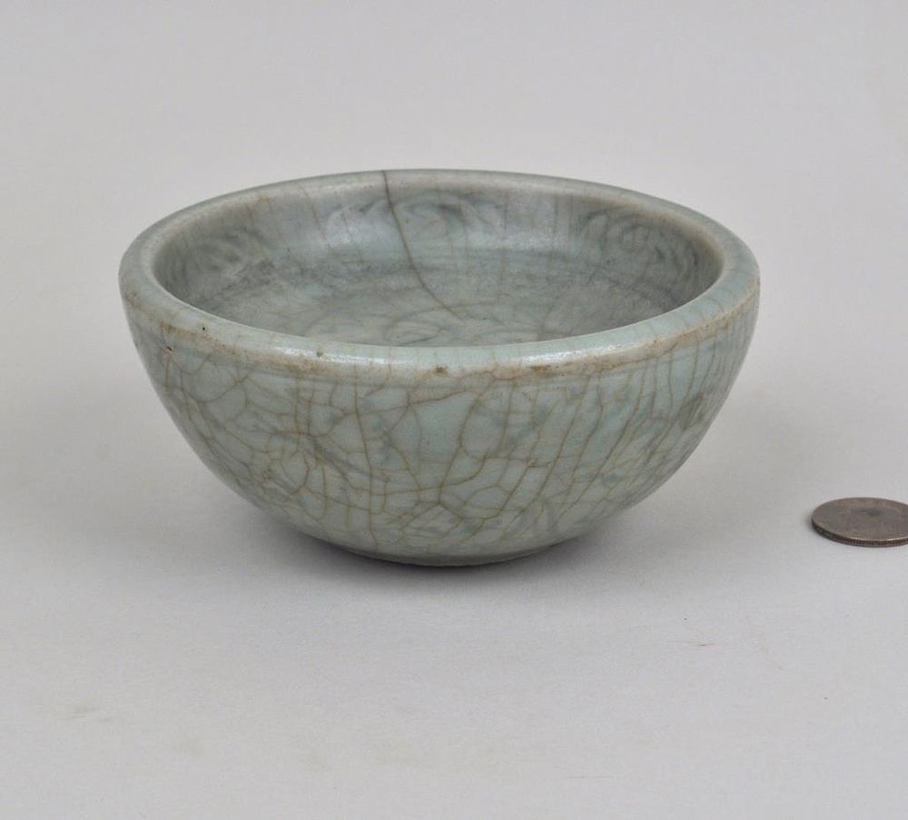 Appraisal: Ming Celadon Crackle Glazed Warming Bowl with lotus motif and