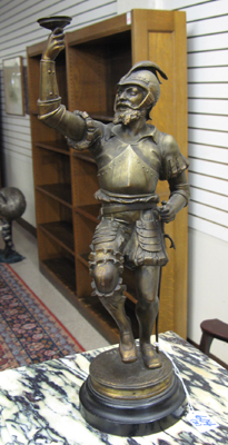 Appraisal: PAIR GERMAN SPELTER FIGURES an armored soldier raising his cup