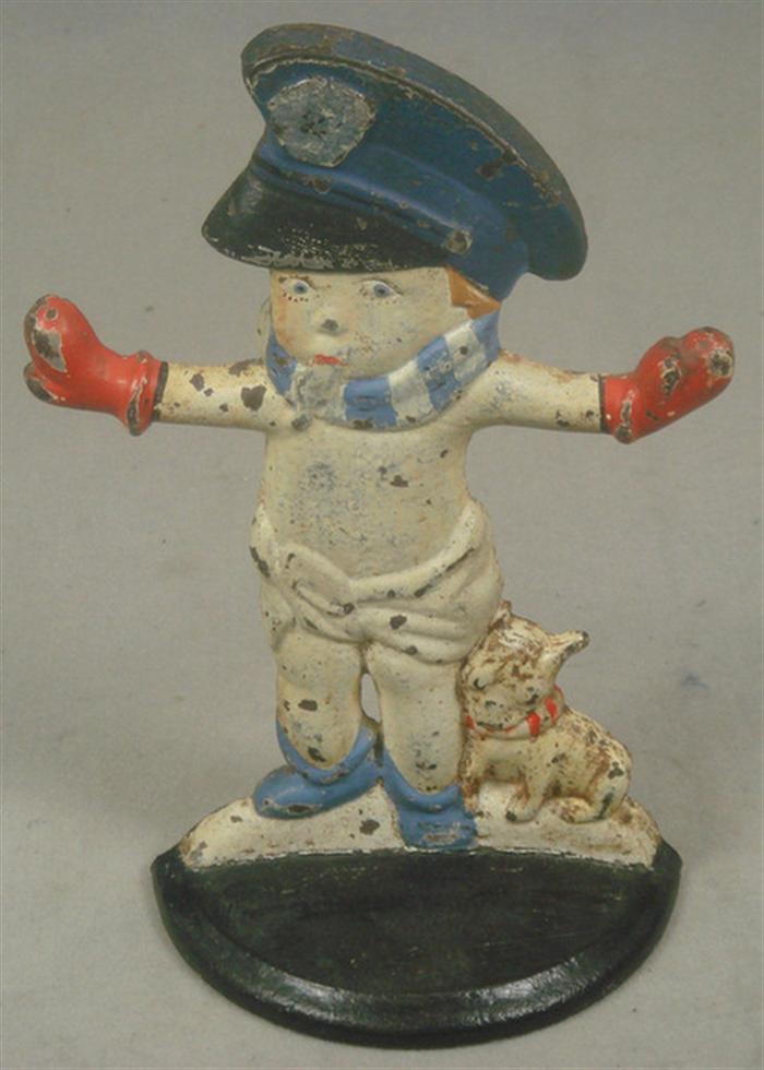 Appraisal: Cast iron doorstop large colorful child crossing guard accompanied by