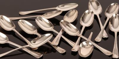 Appraisal: A matched set of fourteen Hanoverian pattern silver table spoons