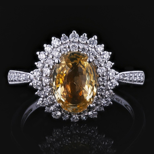 Appraisal: ct unheated yellow sapphire and ctw diamond platinum ring GIA