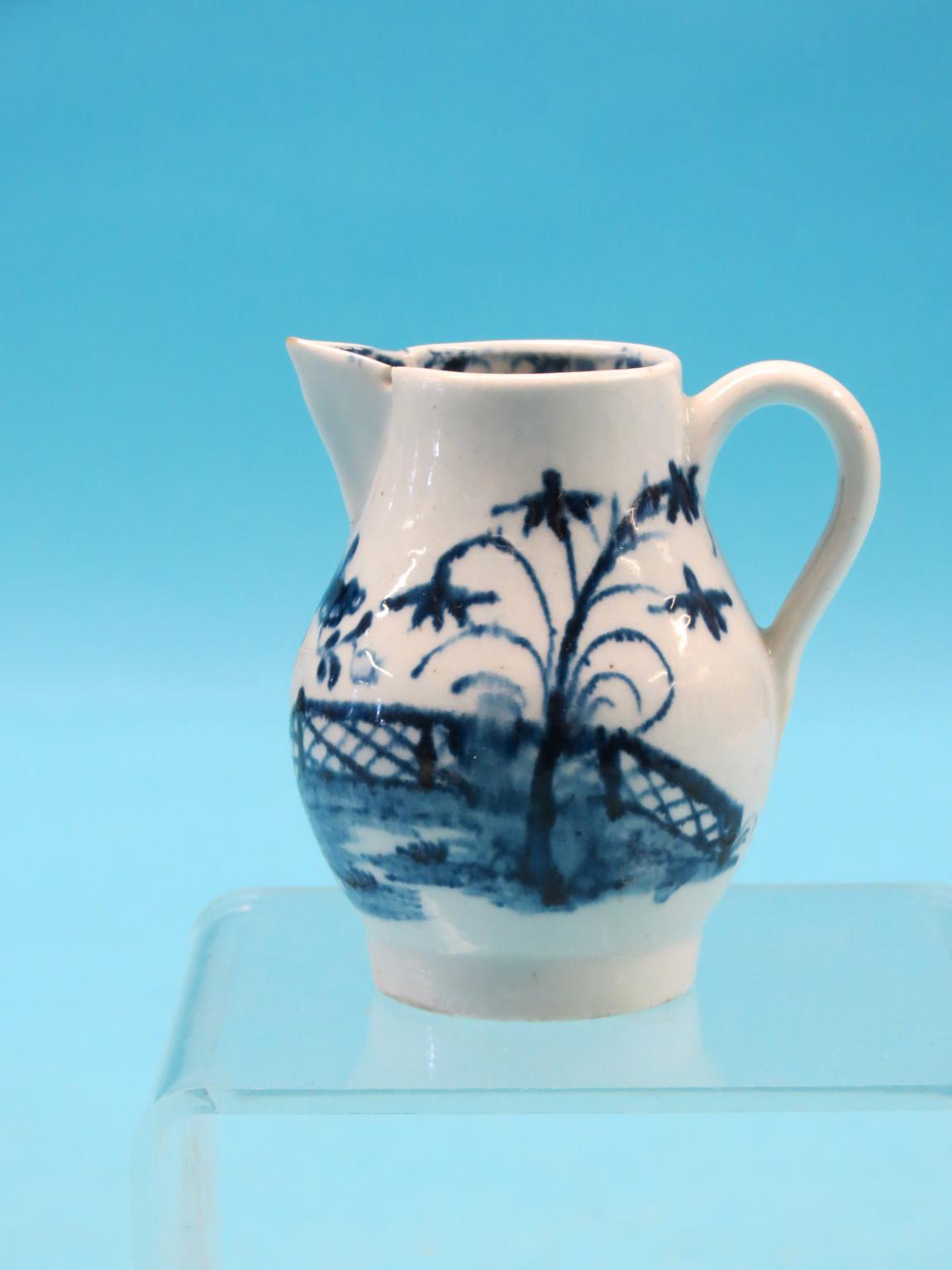 Appraisal: A Lowestoft sparrow-beak cream jug bulbous-shape painted with a floral