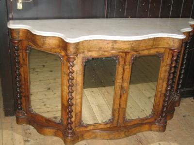 Appraisal: A VICTORIAN WALNUT CREDENZA of serpentine D form with white