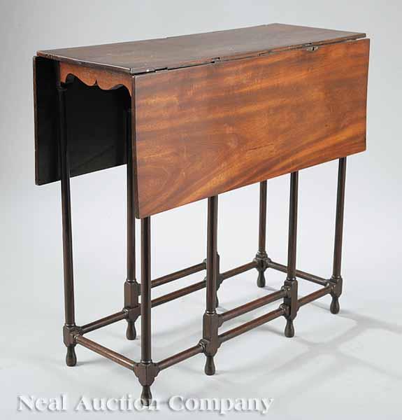 Appraisal: An Antique Queen Anne-Style Mahogany Gate-Leg Table the drop leaves