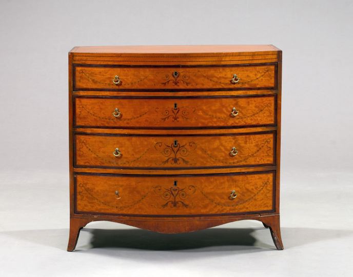 Appraisal: Edwardian Satinwood Bowfront Chest ca the bowed and banded top