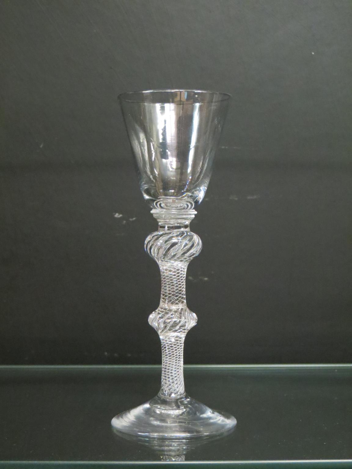 Appraisal: An th century English cordial glass round funnel bowl on