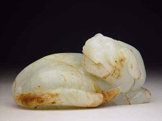 Appraisal: ANTIQUE CARVED JADE LION Antique Chinese carved jade model of