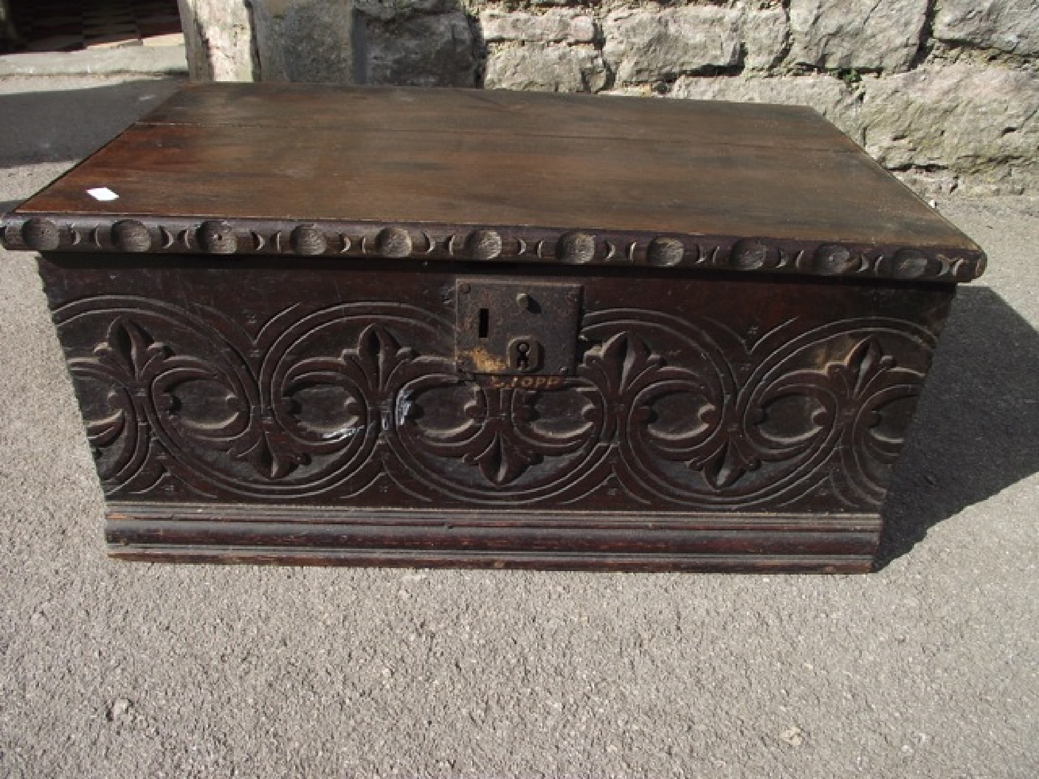 Appraisal: A small antique oak box with hinged lid ironwork carrying