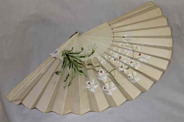 Appraisal: A JAPANESE SILK PAINTED FAN with bone guards