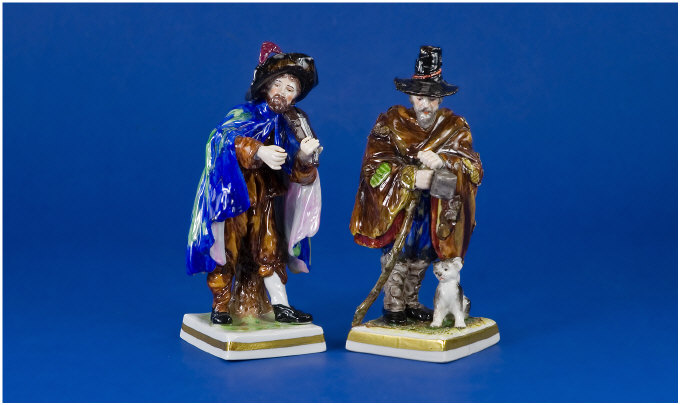 Appraisal: Matched Pair of Volkstedt Figures One a wandering beggar with