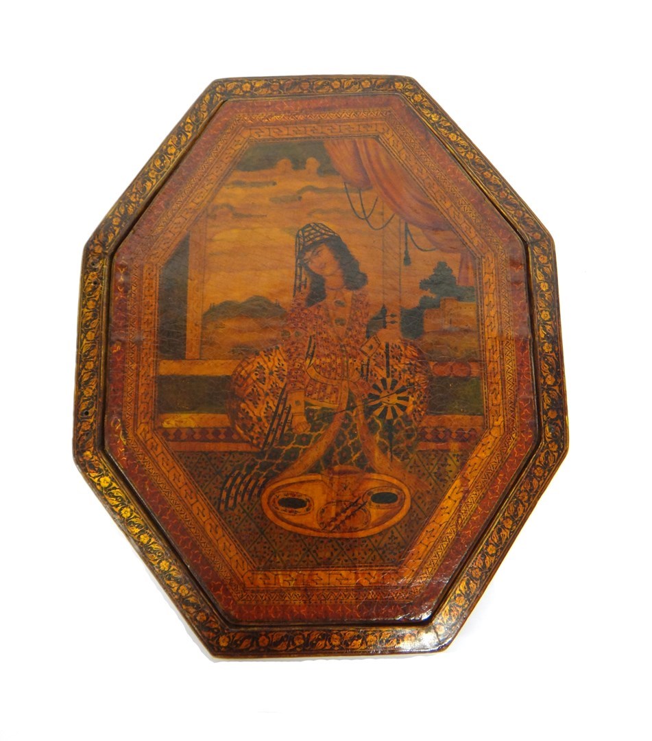 Appraisal: A Qajar lacquered papier mache octagonal mirror case Iran c