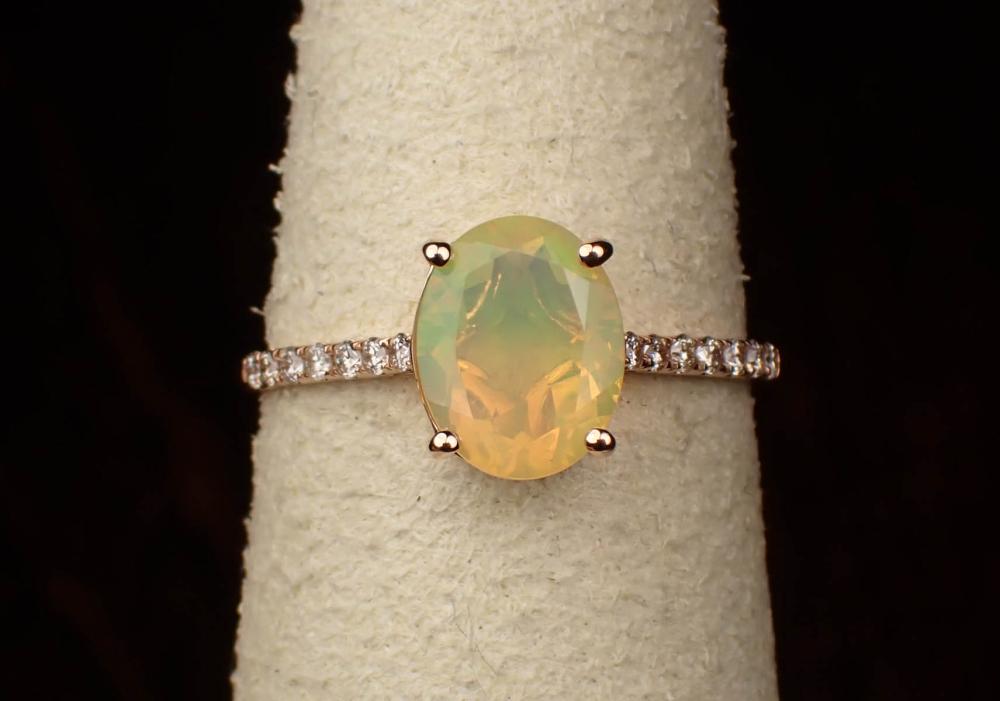 Appraisal: FIRE OPAL DIAMOND AND FOURTEEN KARAT GOLD RING The rose