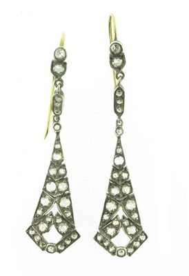 Appraisal: A pair of diamond drop earrings set in silver and