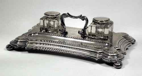 Appraisal: An Edward VII silver rectangular two division inkstand of shaped