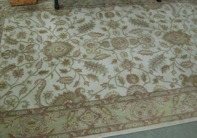 Appraisal: HAND KNOTTED ORIENTAL CARPET Indo-Persian overall floral vine design on