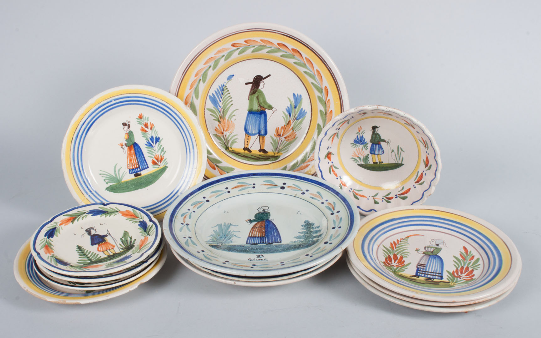 Appraisal: assorted Quimper faience plates and bowls some Henriot and Hubaudiere