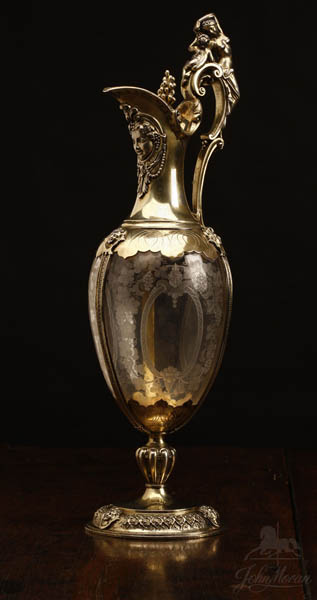 Appraisal: Victorian sterling mounted etched glass claret jug Victorian sterling mounted