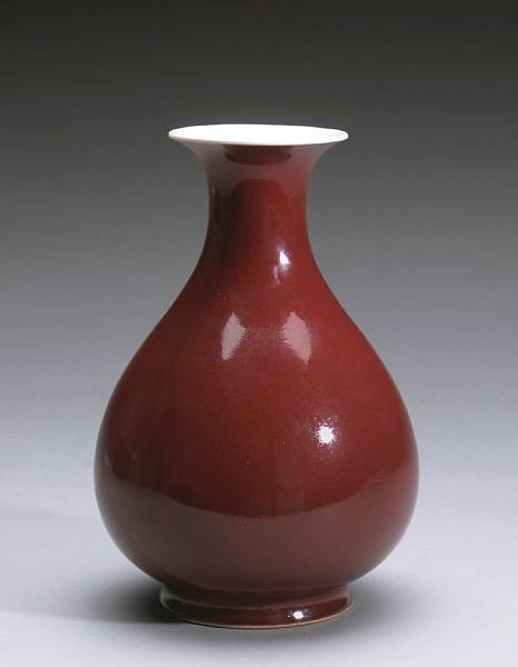 Appraisal: A copper red glazed porcelain vase Qianlong Mark Guangxu Period