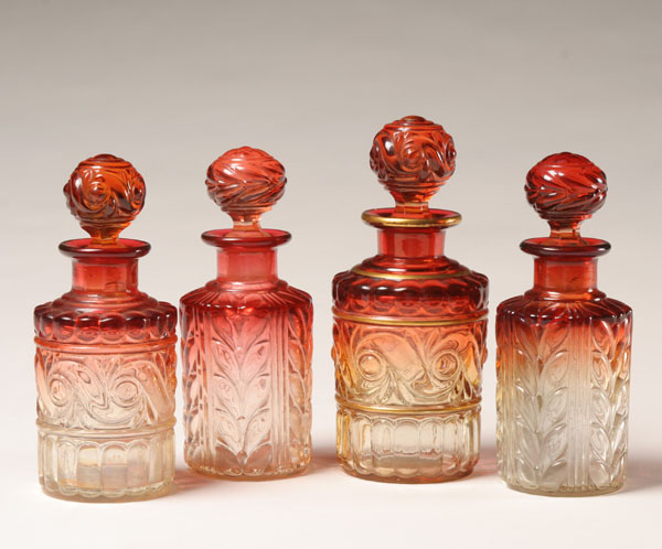 Appraisal: Baccarat amberina pressed glass bottles largest and one smaller with