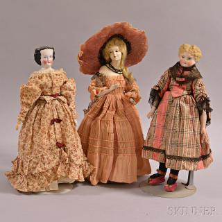 Appraisal: Three Dolls a French composition fashion doll lamp a bisque