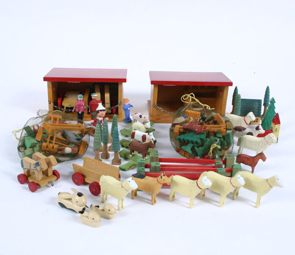 Appraisal: Lot Erzgebirge German wooden toys two stables many figures and