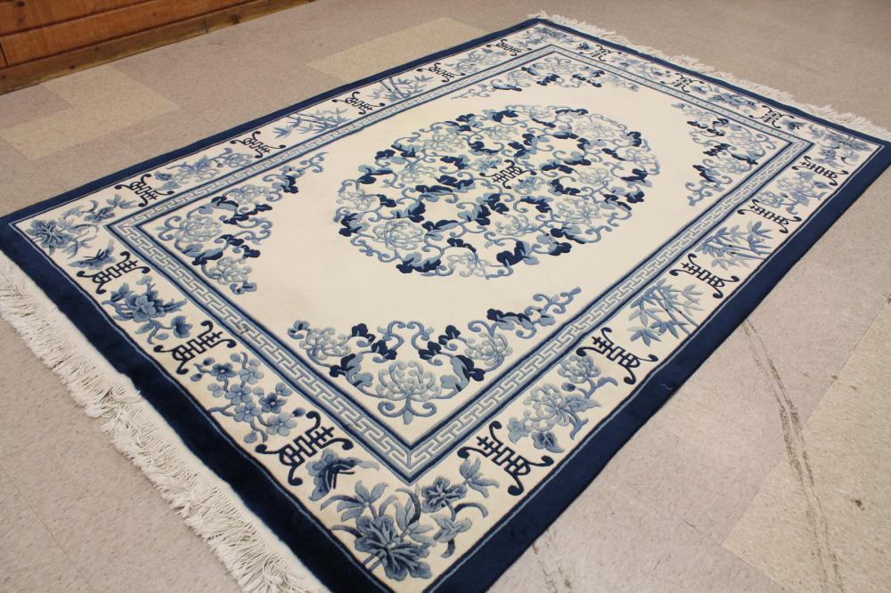 Appraisal: HAND KNOTTED CHINESE CARPET traditional sculpted Peking design in several