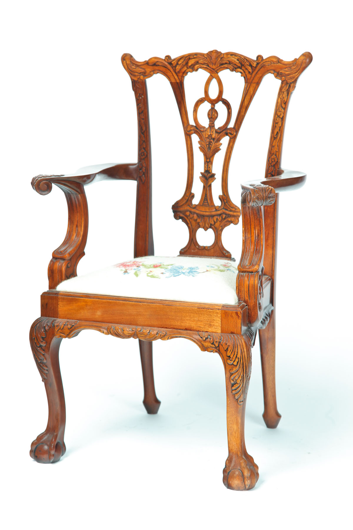 Appraisal: CHILD'S CHIPPENDALE-STYLE ARMCHAIR Asian th century mahogany Heavily carved with