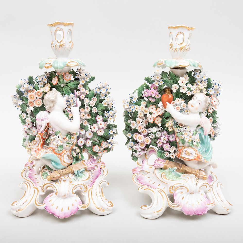 Appraisal: Pair of Derby Porcelain Bocage Chambersticks with Cupids in high