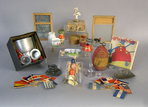 Appraisal: Group of misc toys th c to include Tootsietoys stick