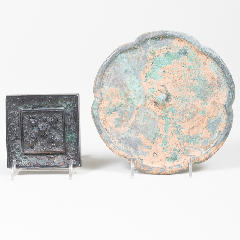 Appraisal: TWO CHINESE BRONZE MIRRORS The first square cast with animals