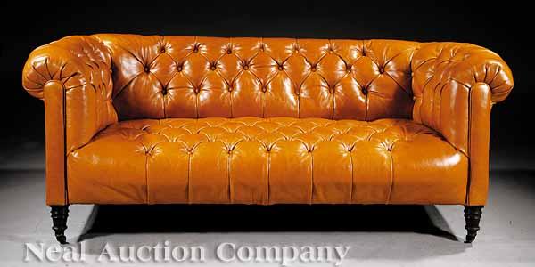 Appraisal: An Attractive English Chesterfield Sofa late th c scrolled arms