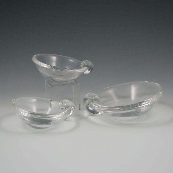 Appraisal: Lot of three Steuben ashtrays in clear crystal glass All