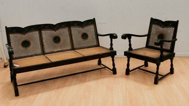 Appraisal: An Indonesian wooden and cane colonial sofa and two chairs