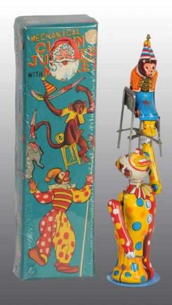 Appraisal: Tin Clown Juggling Monkey Wind-Up Toy Description Japanese Working Made