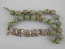 Appraisal: A green hardstone bead necklace beads approx mm diameter AF