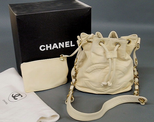 Appraisal: Chanel vanilla kid leather drawstring purse with quilted front logo