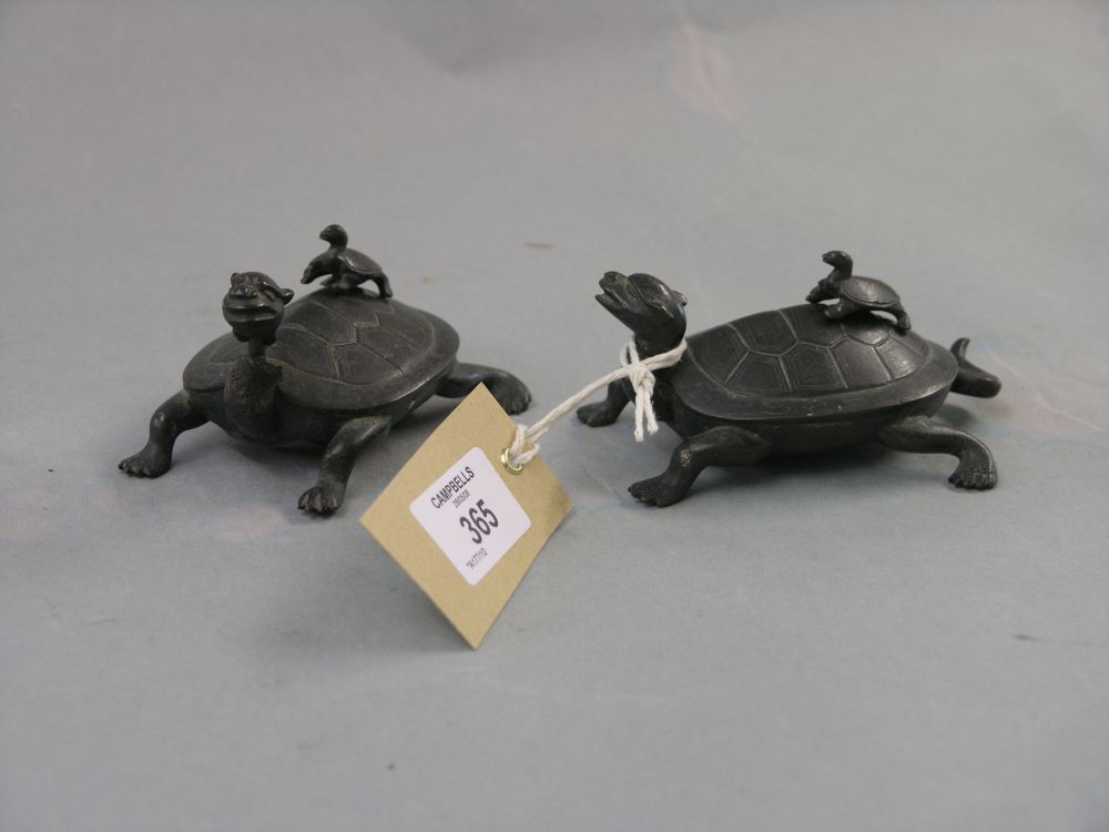 Appraisal: A small pair of Japanese bronze turtles in