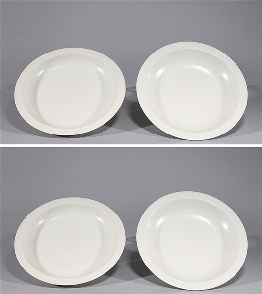 Appraisal: Four Chinese white glazed porcelain plates each with six-character Kangxi