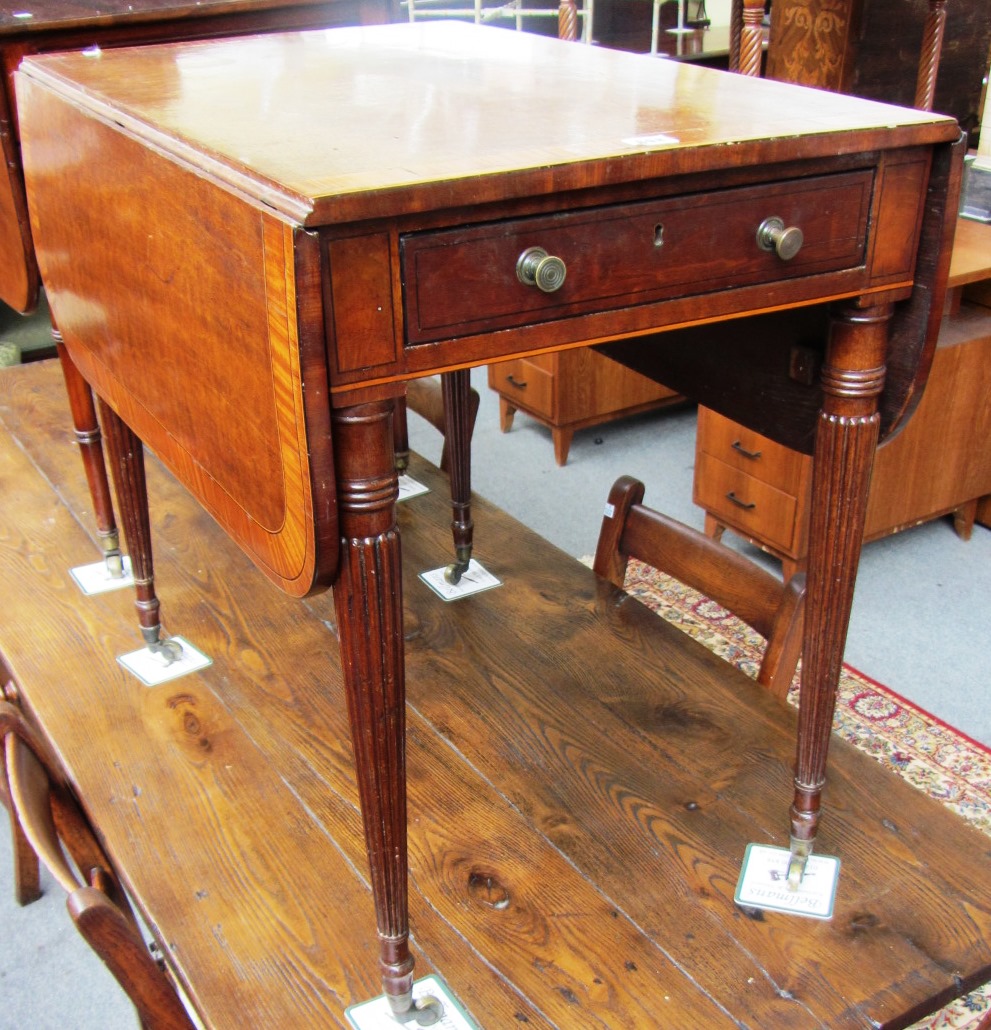 Appraisal: An early th century satinwood banded mahogany Pembroke table with