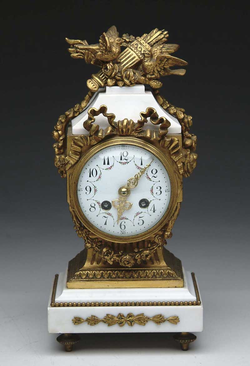 Appraisal: FANCY FRENCH MARBLE AND BRONZE SHELF CLOCK BY G VIGNON