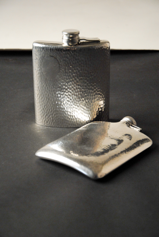 Appraisal: A Hammered Sterling Flask and a Hammered Silverplate Flask the