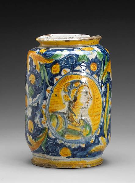 Appraisal: An Italian Sicilian maiolica polychrome alberello th century The cylindrical