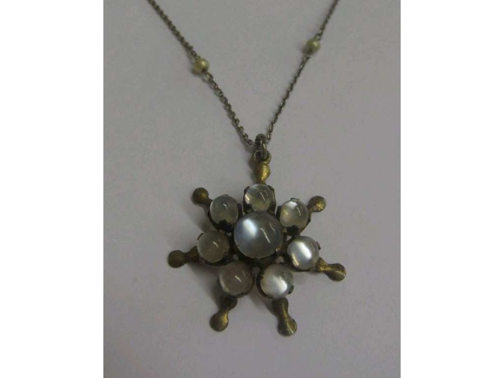 Appraisal: Silver gilt moonstone set star shaped pendant on pearl spacer