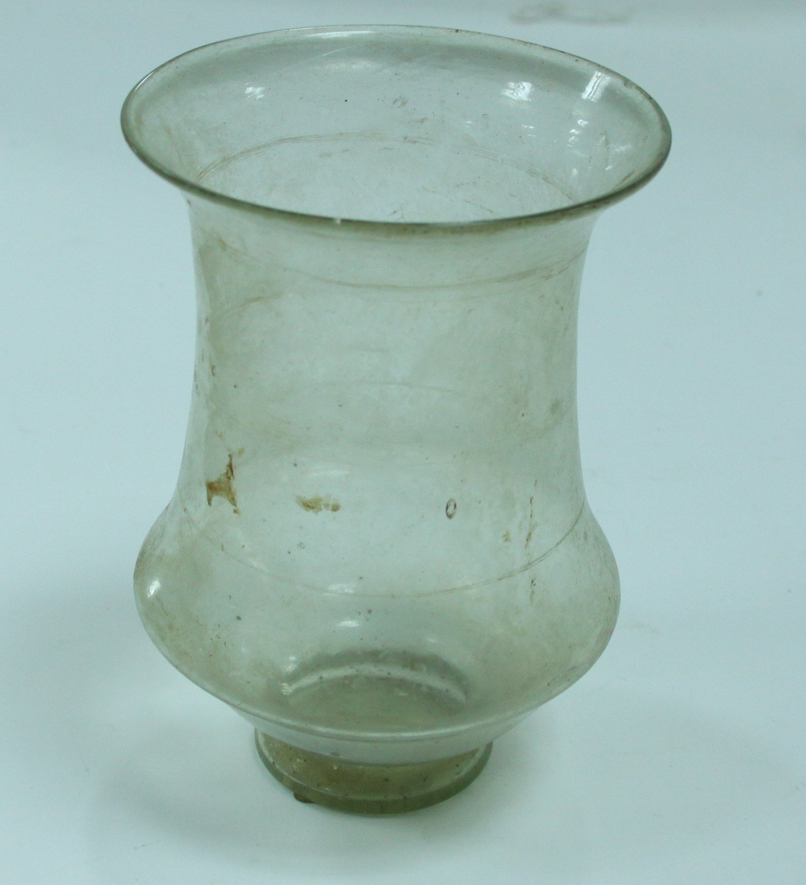 Appraisal: An ancient Roman glass vase of baluster form with narrow