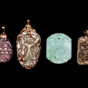 Appraisal: Four Chinese Pendants comprising one pink hardstone example one gilt