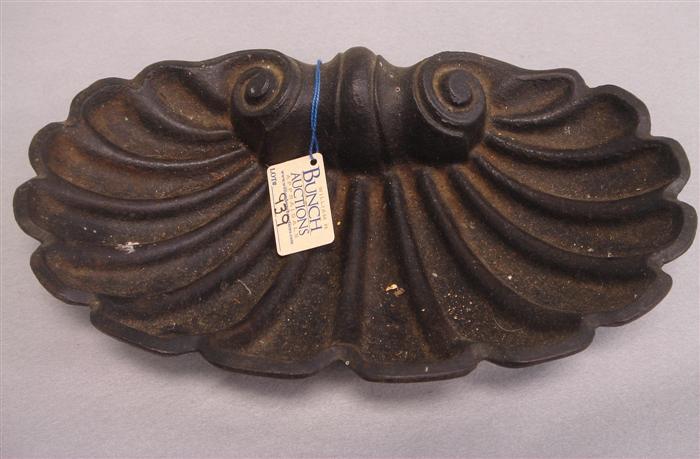 Appraisal: Cast iron shell form drain pan x with a x