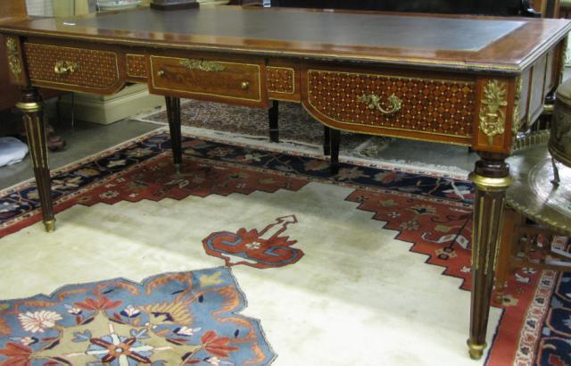 Appraisal: Period style Rosewood leather top desk banded and inlaid with