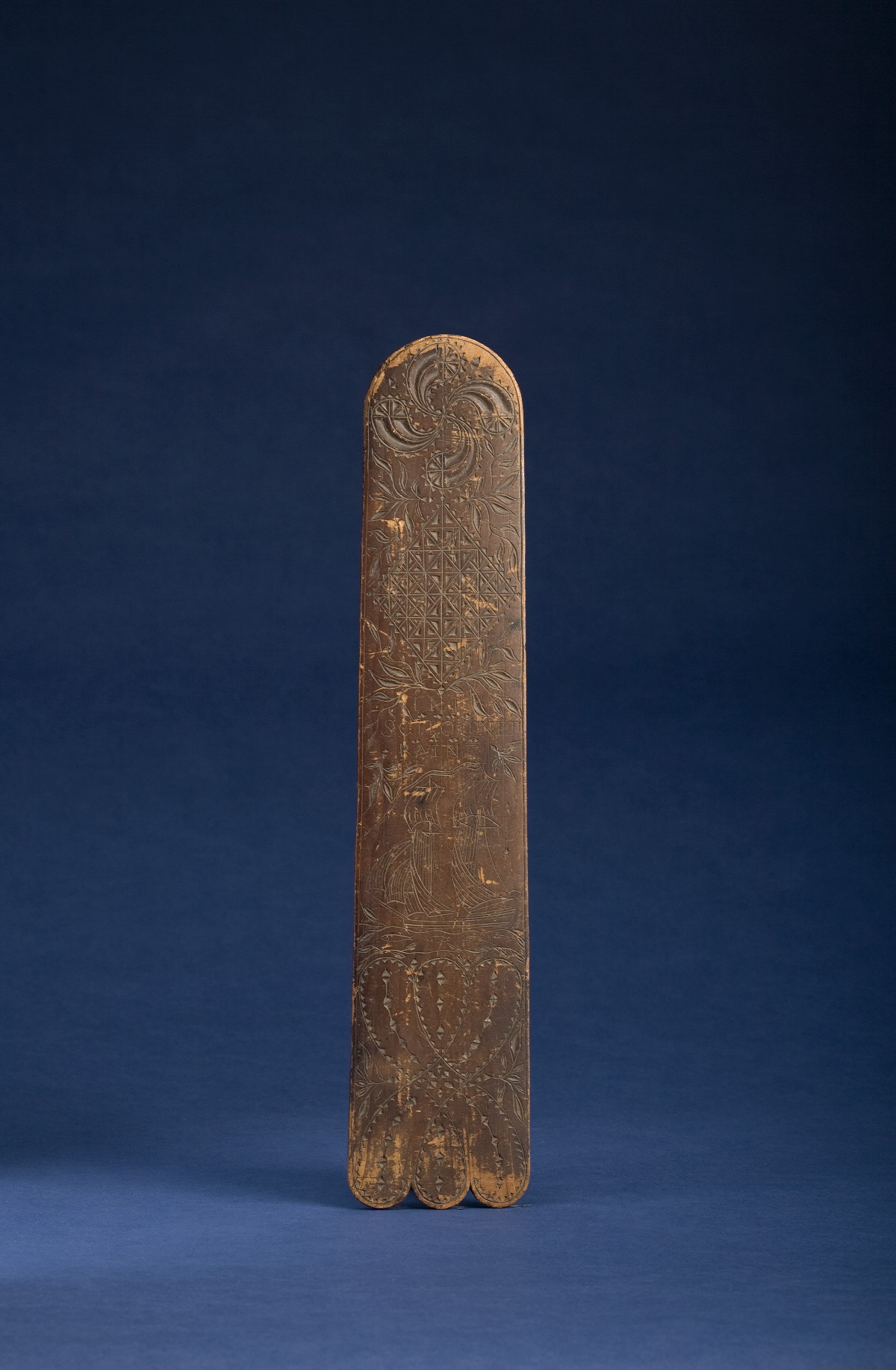 Appraisal: FINE INCISE-CARVED PINE BUSK FROM THE SCHOONER quot RAINE quot