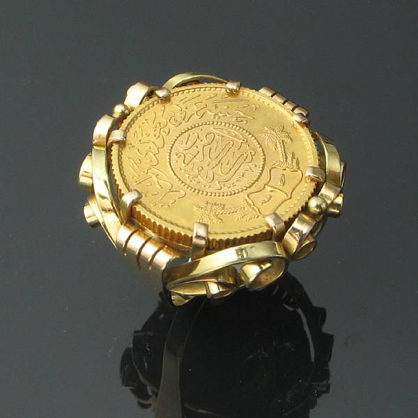 Appraisal: A gold coin ring a high karat gold coin in