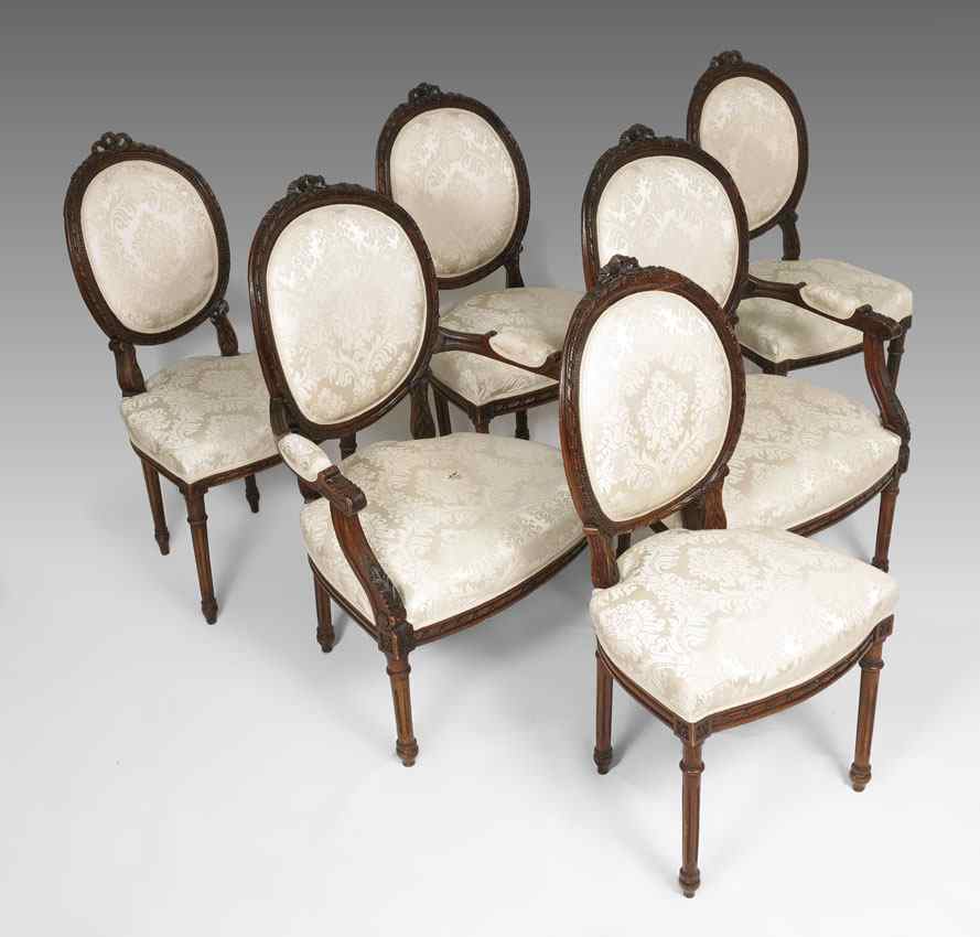 Appraisal: FRENCH STYLE CARVED DINING CHAIRS arm and side chairs carved